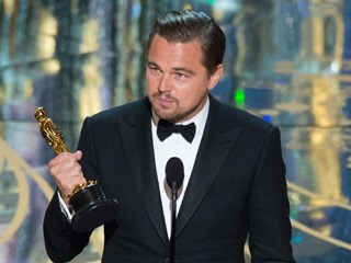 A gracious Leonardo DiCaprio gets his Oscar, acknowledges climate change in speech